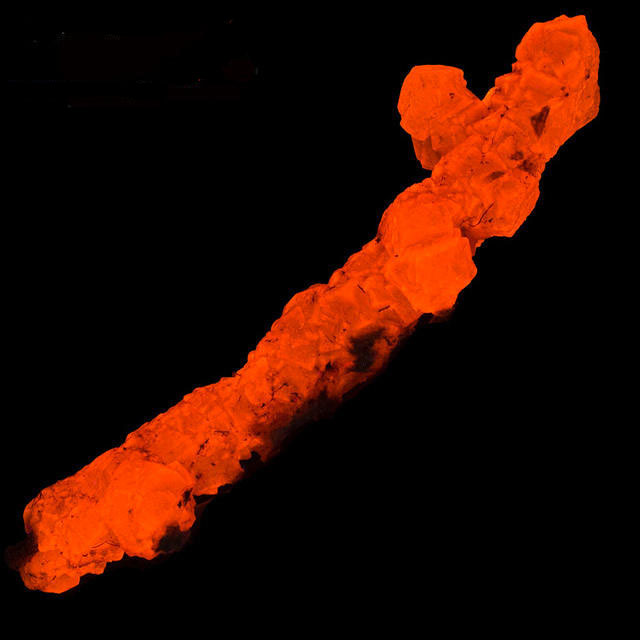 Fluorescence under shortwave UV light.
