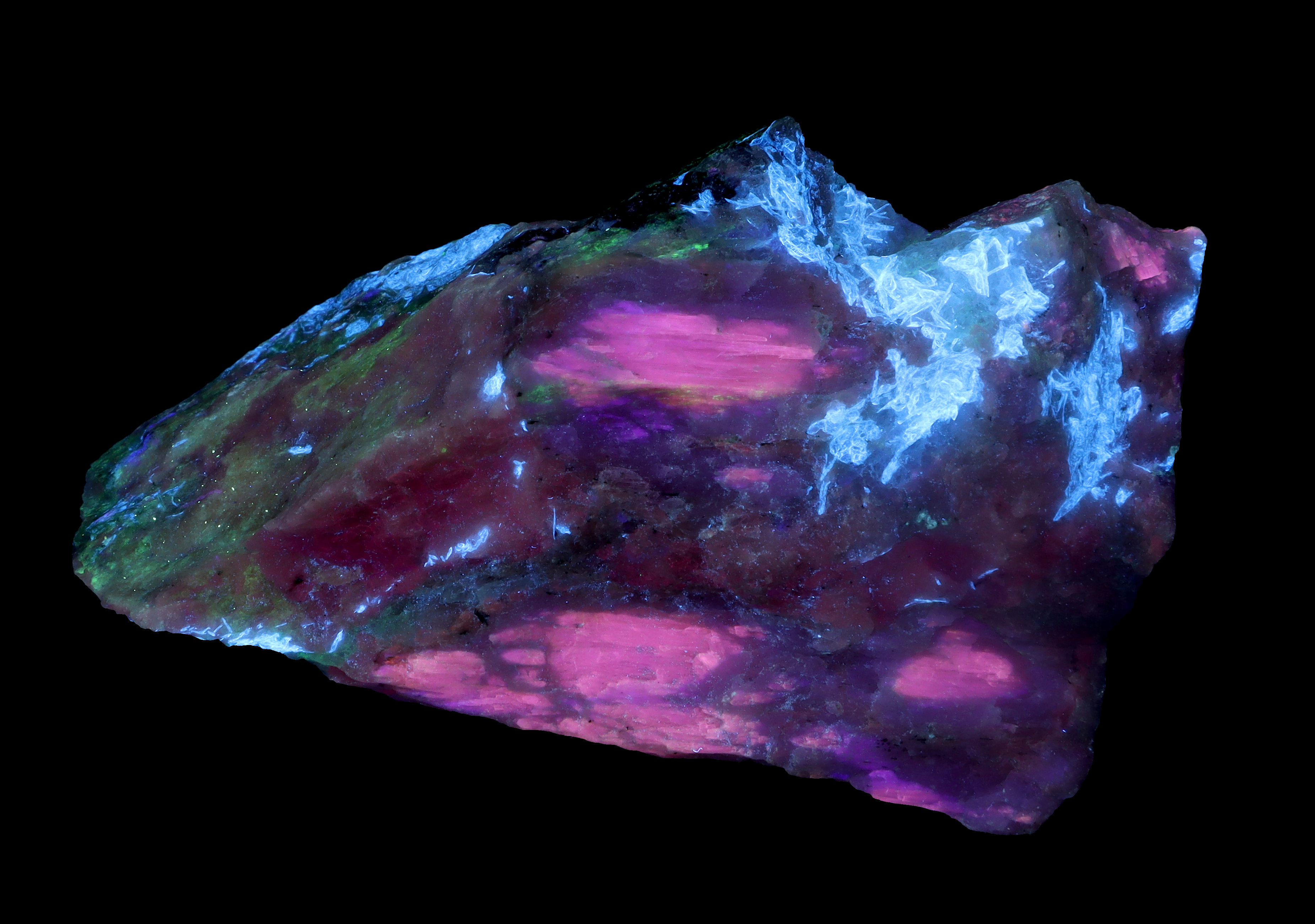 Fluorescence under shortwave & midwave UV light.