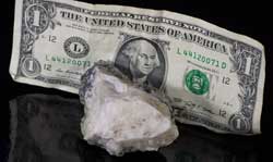 Normal light. Specimen size image compared to a US dollar bill.