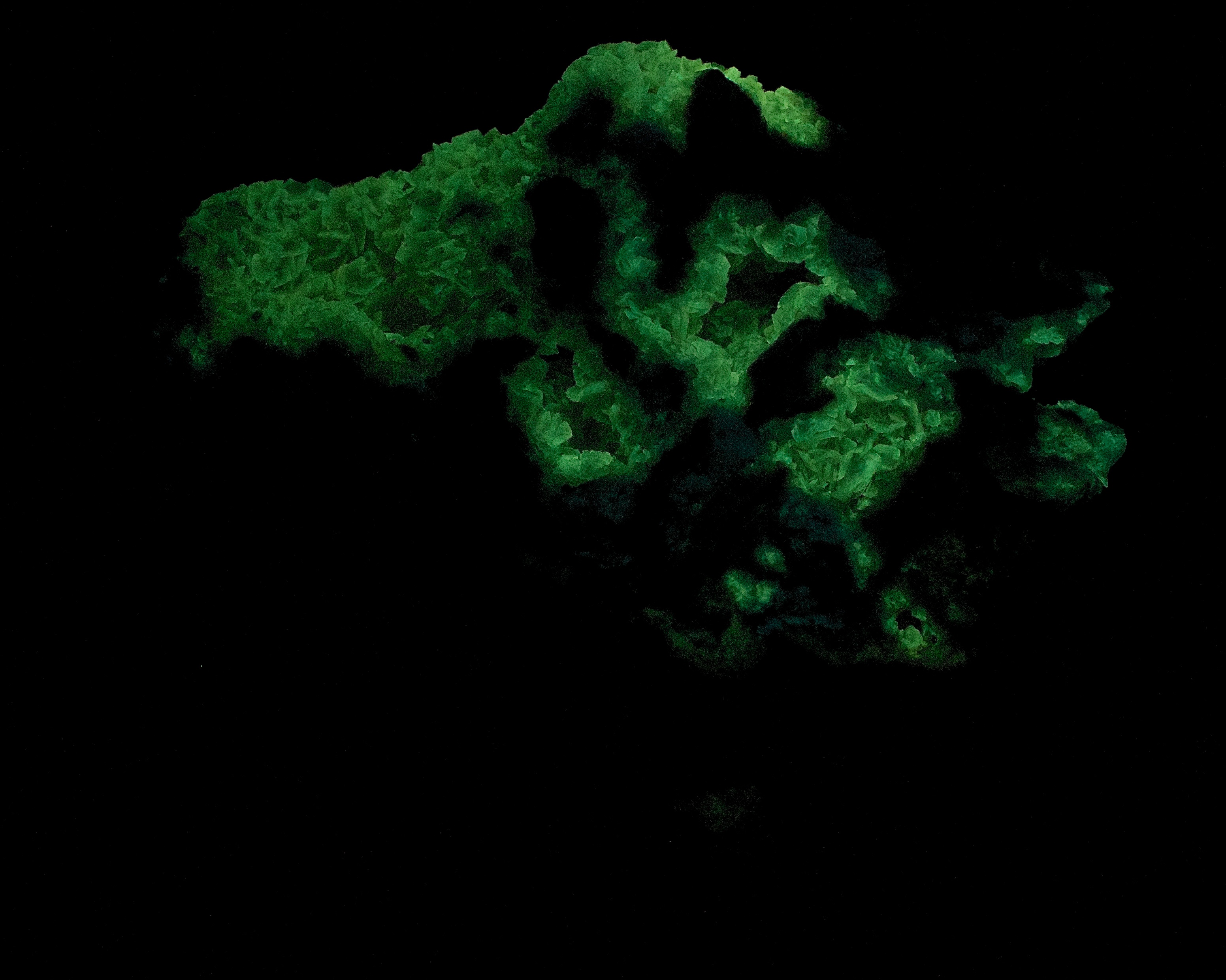 Afterglow after exposure to shortwave UV light.