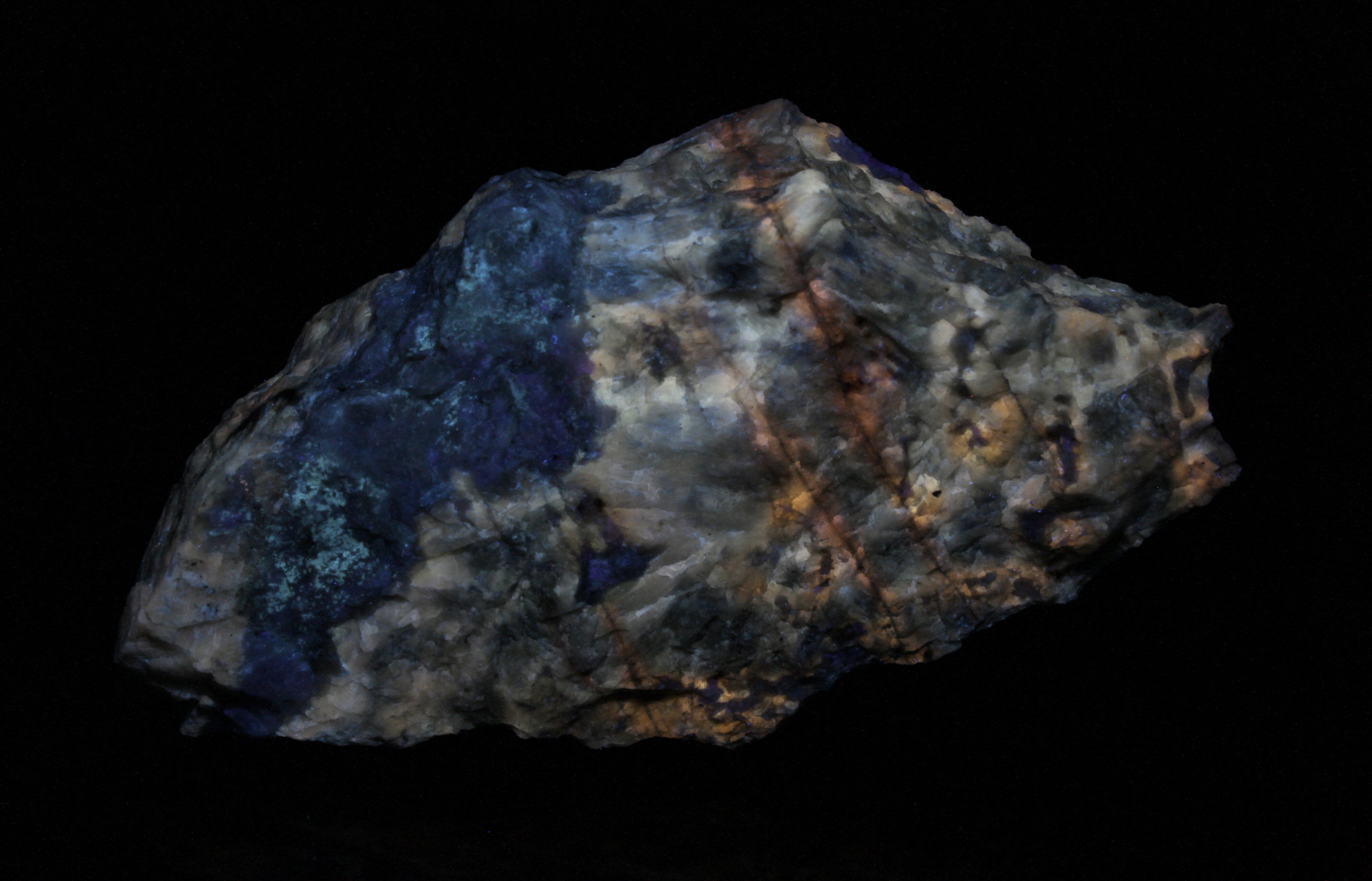 Fluorescence under midwave UV light.