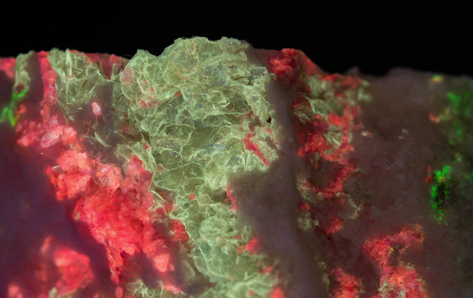 Fluorescence under shortwave UV light. Closeup