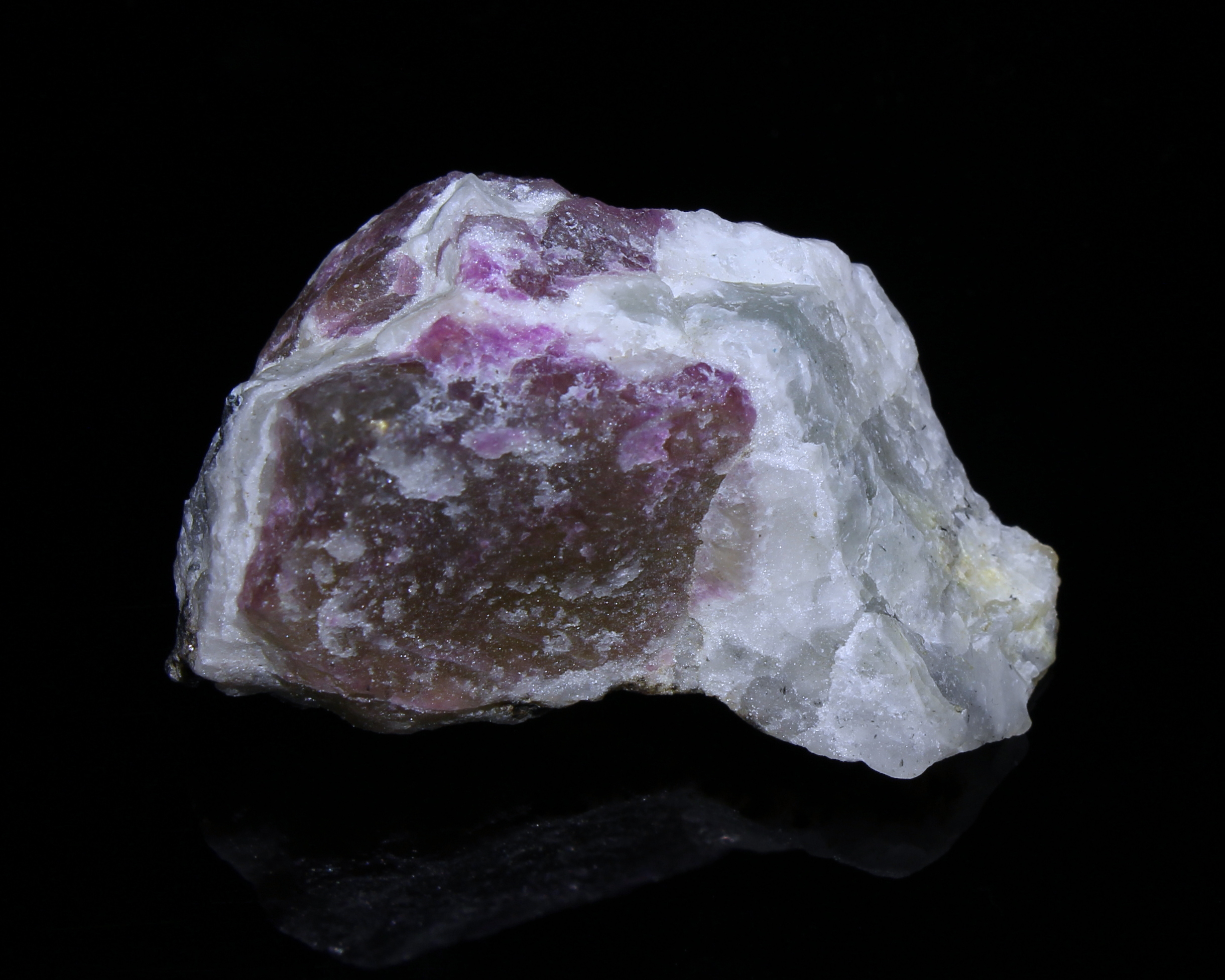 Tenebrescence after exposure to shortwave UV light. Side 2.