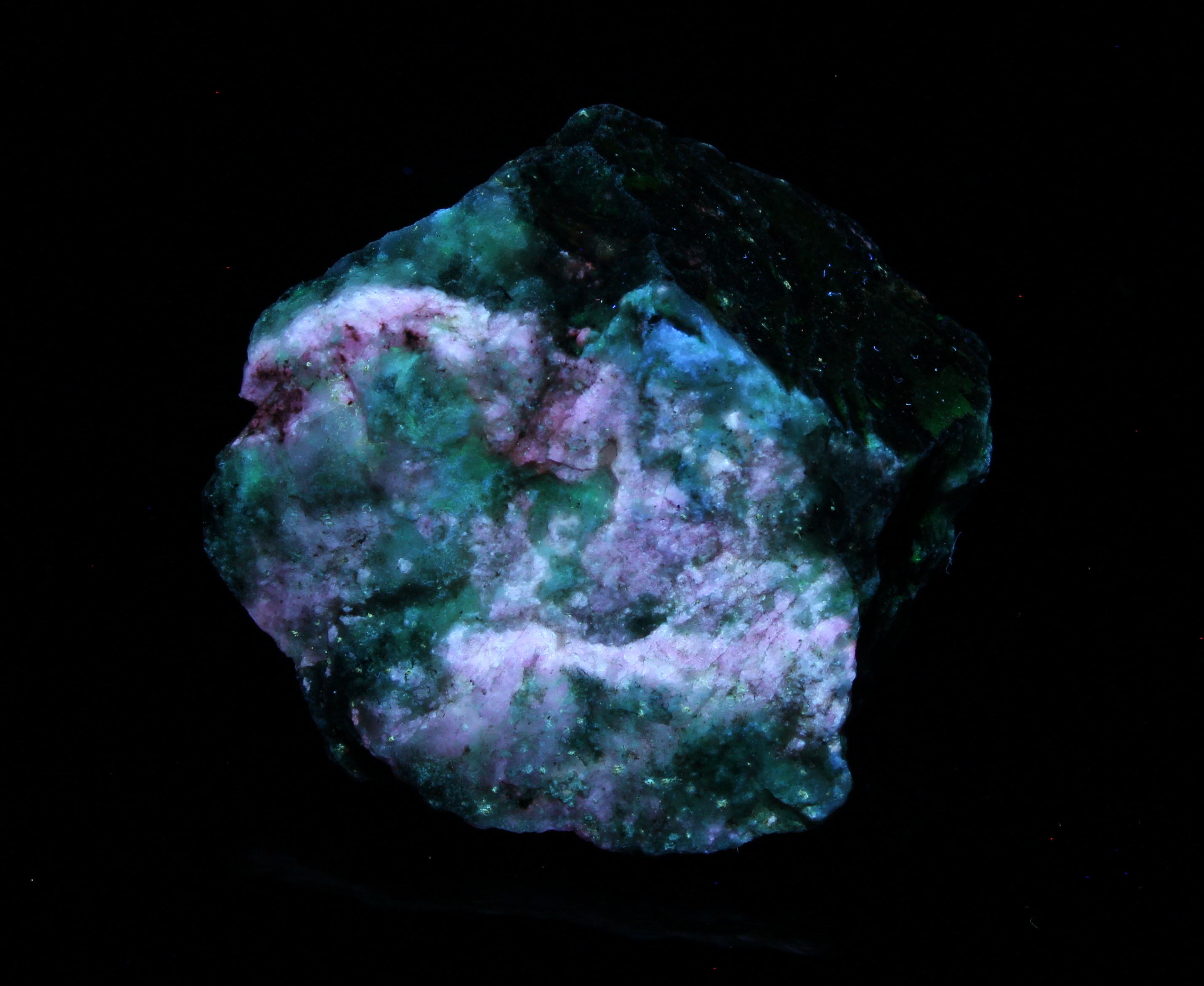 Fluorescence under midwave UV light.