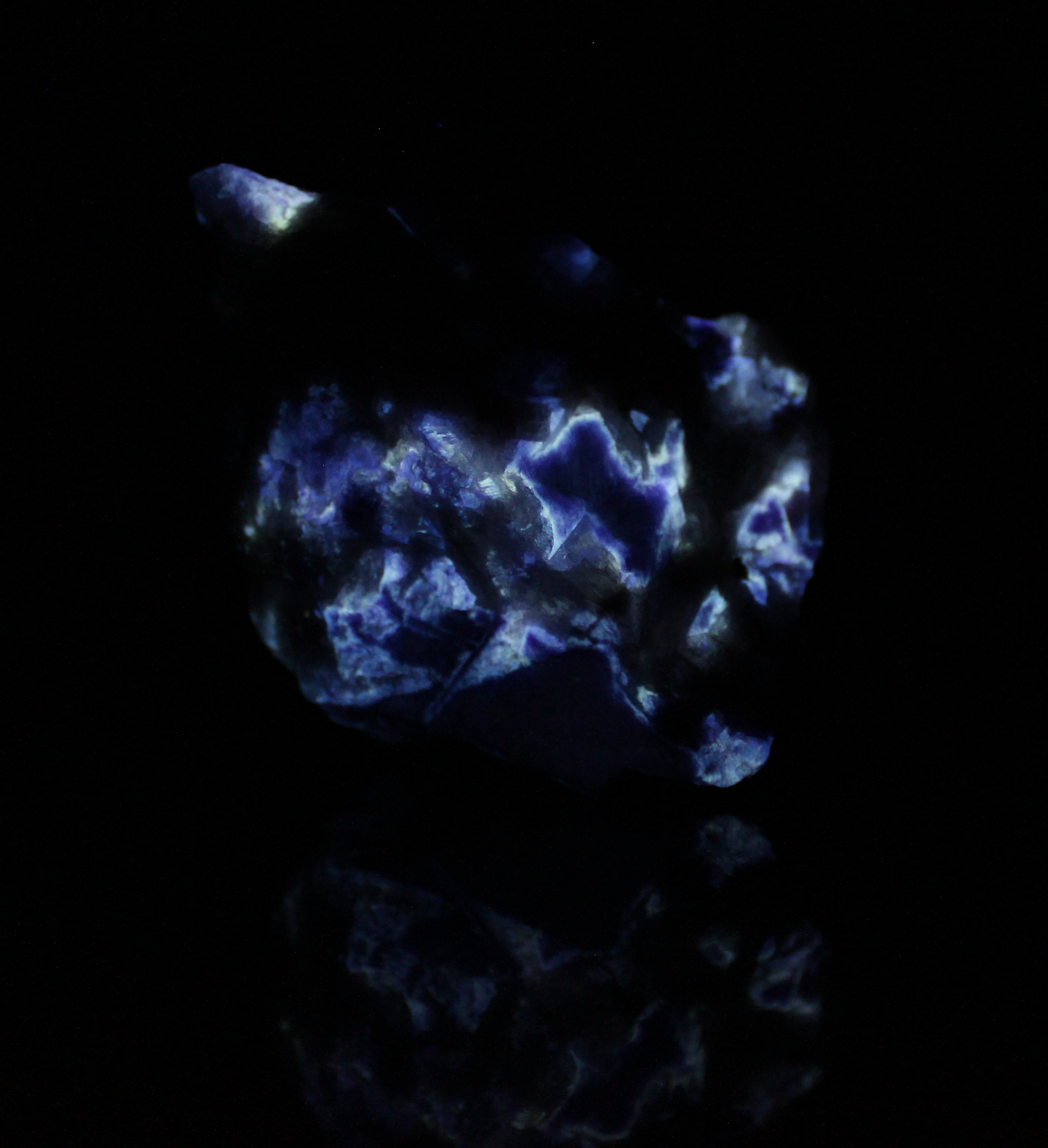 Afterglow after exposure to midwave UV light.