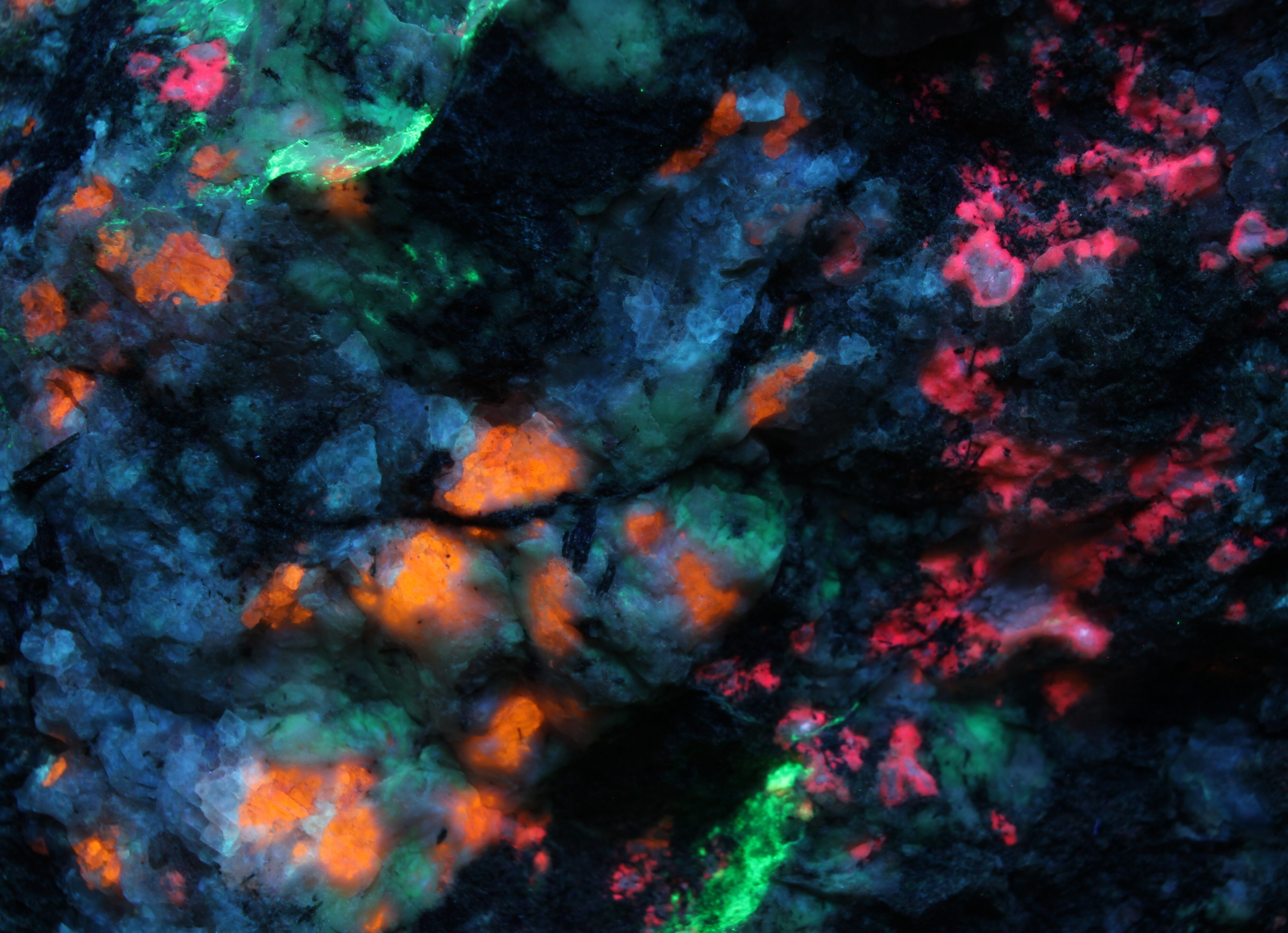Fluorescence under longwave and shortwave UV light. Closeup.