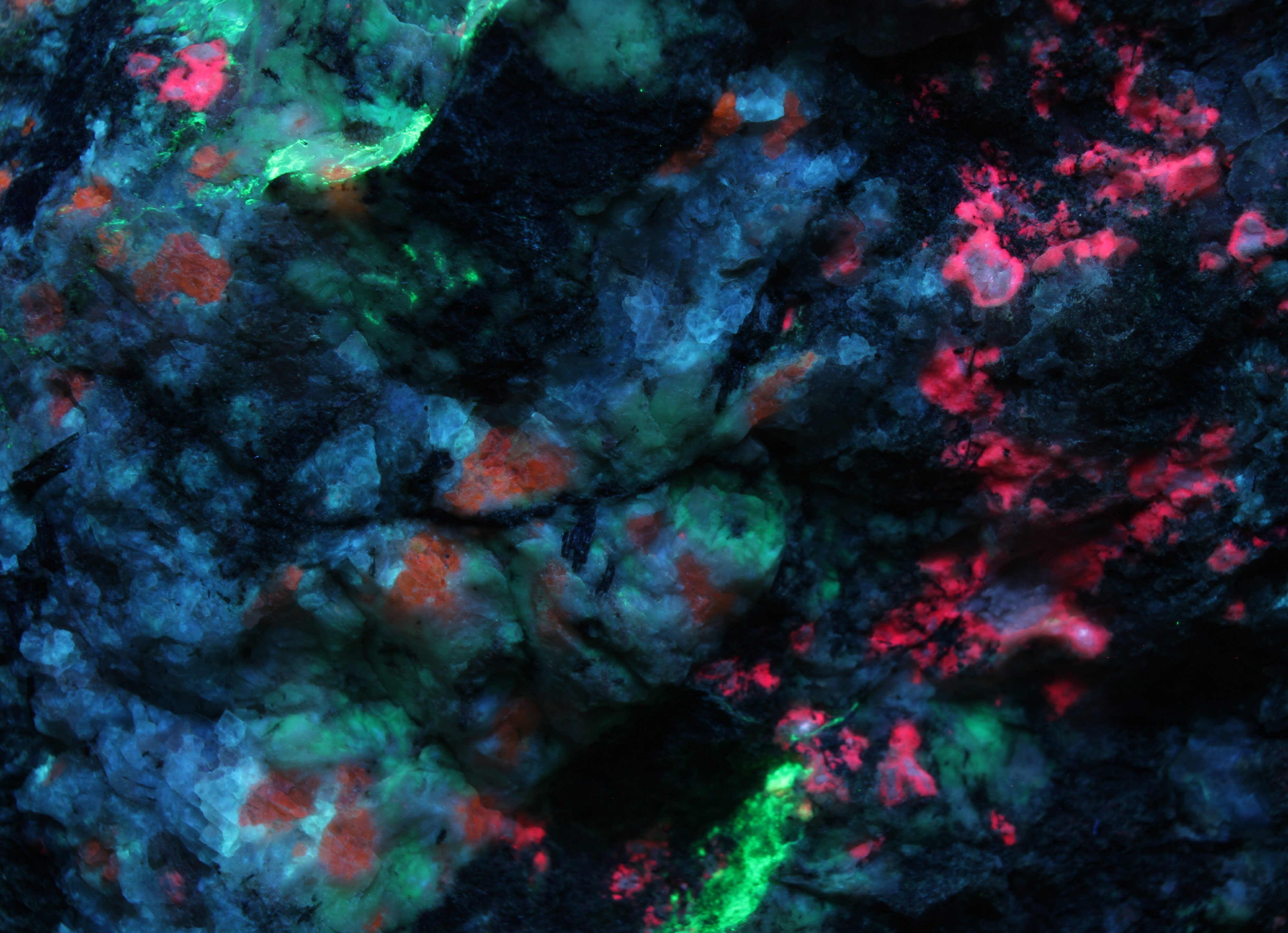 Fluorescence under shortwave UV light. Closeup