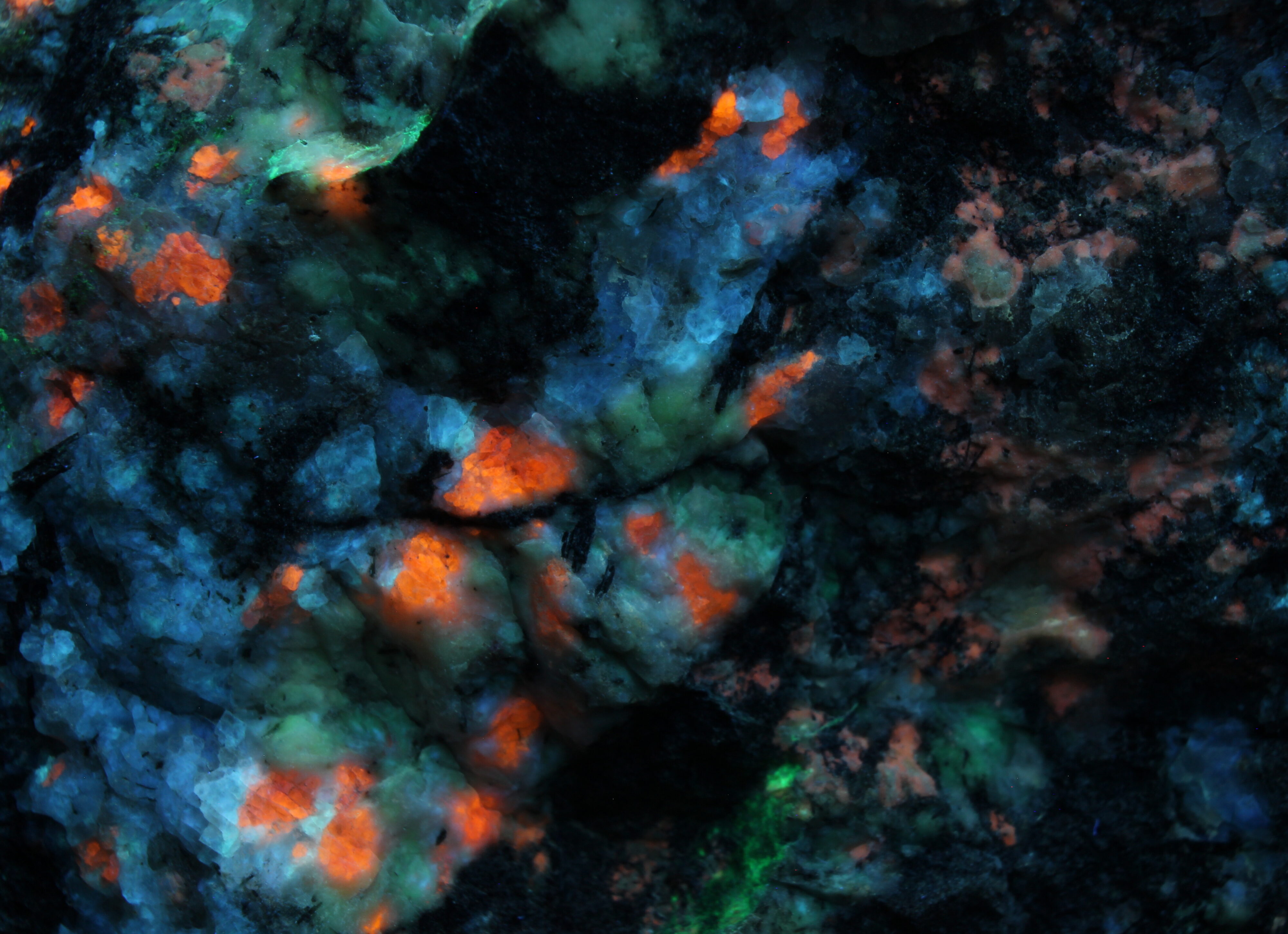 Fluorescence under midwave UV light. Closeup.