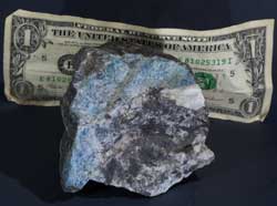 Normal light. Specimen size image compared to a US dollar bill.