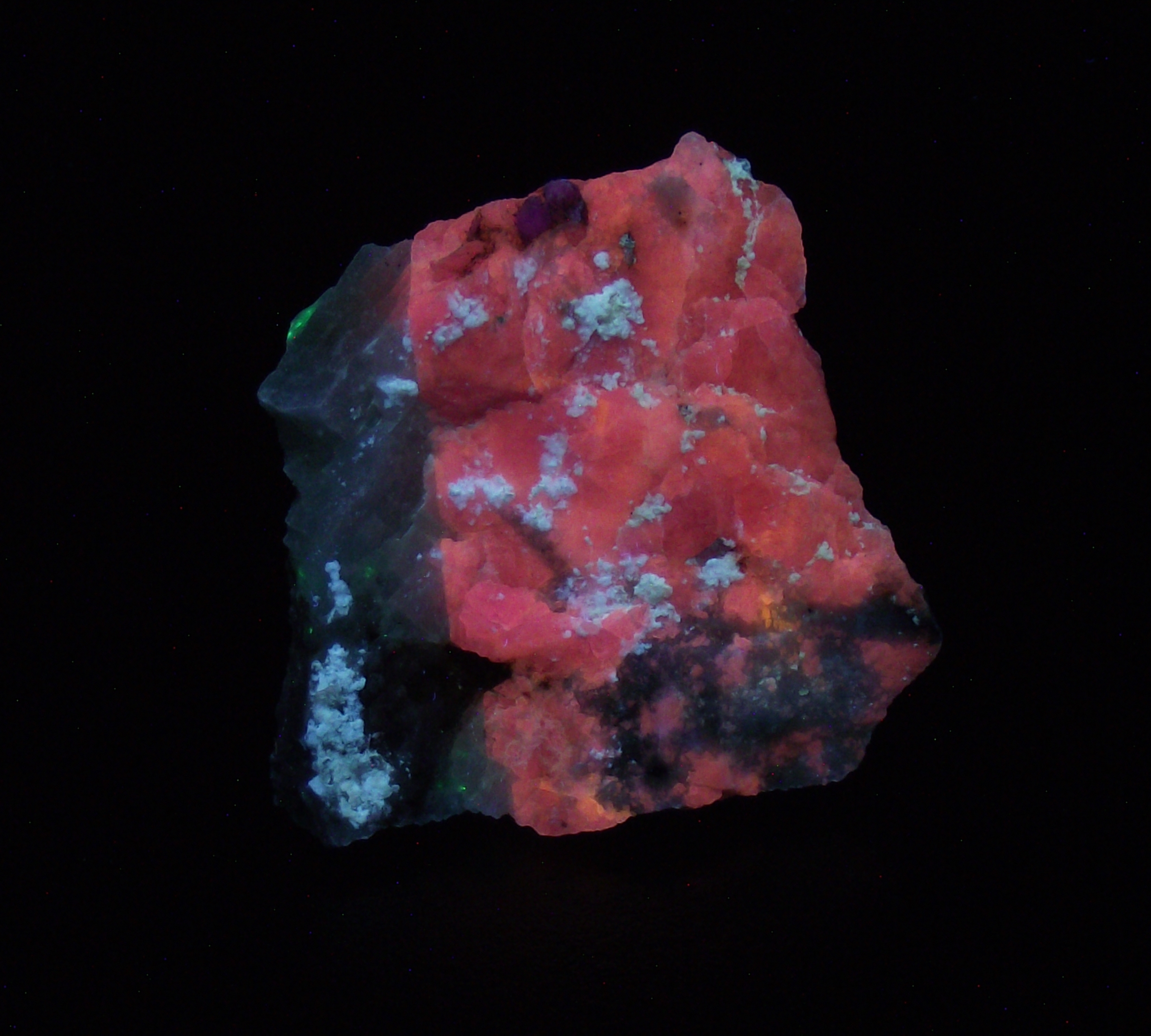 Fluorescence under midwave UV light.