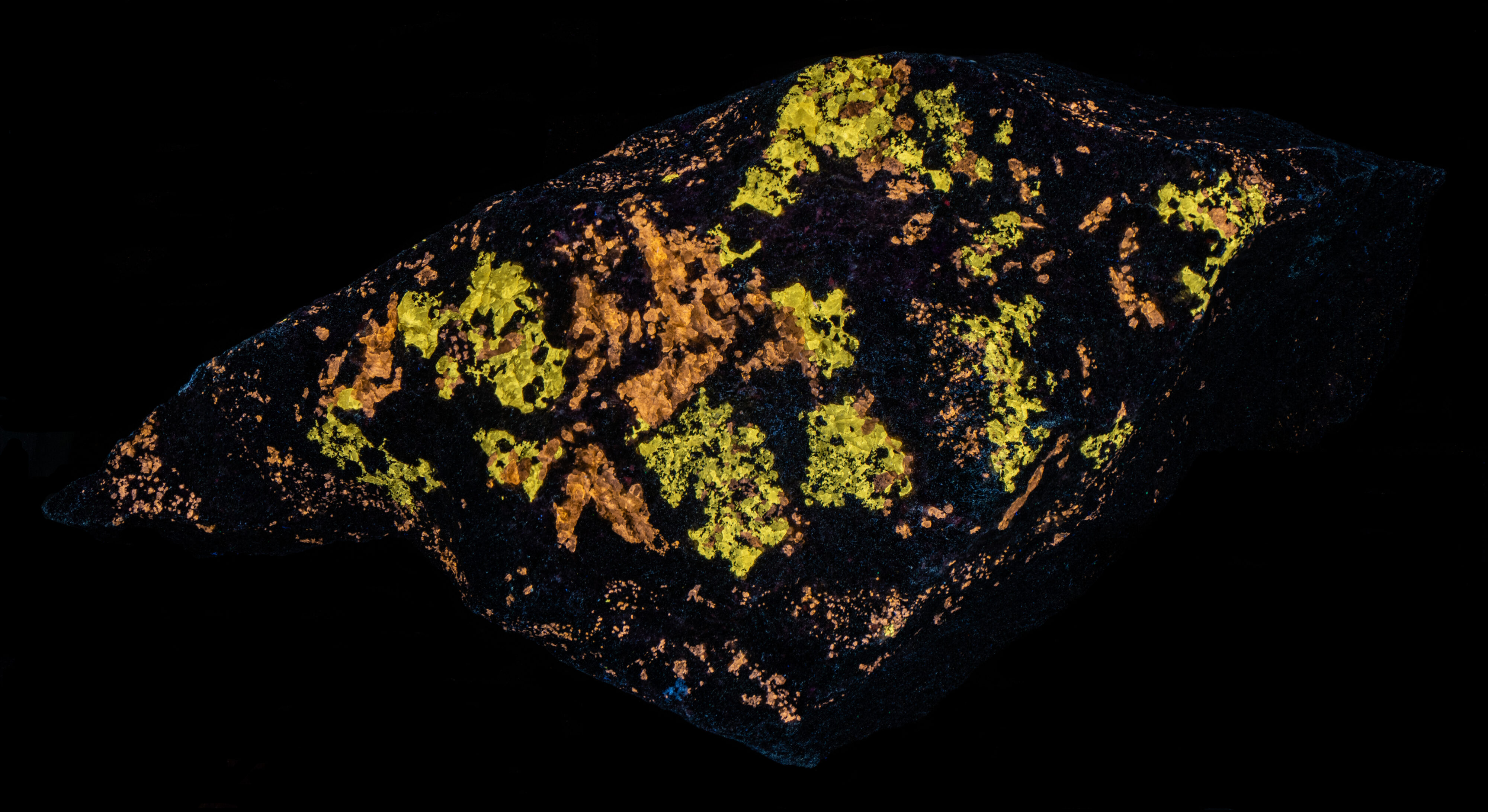Fluorescence under midwave UV light.