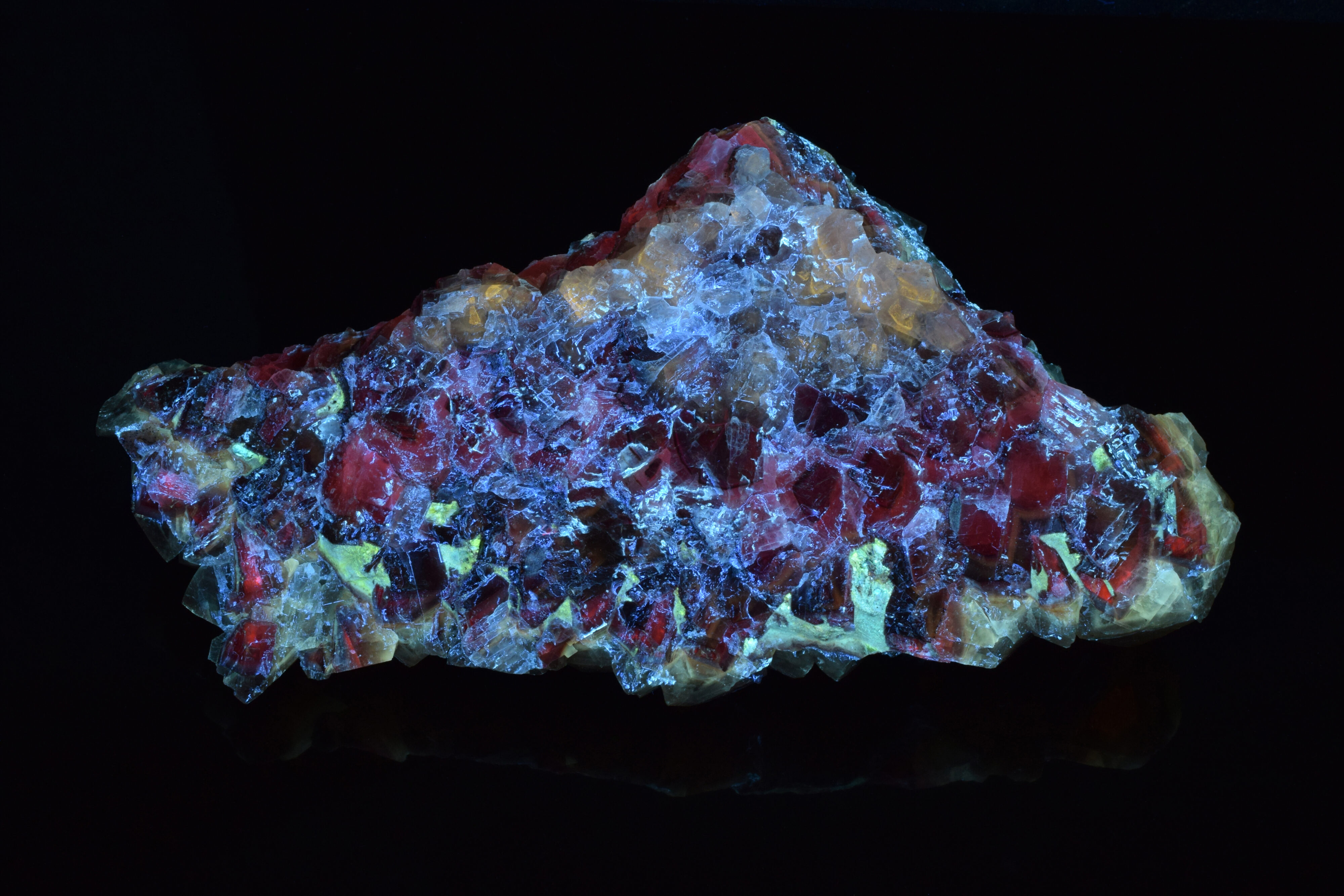 Fluorescence under midwave UV light. Side 2.