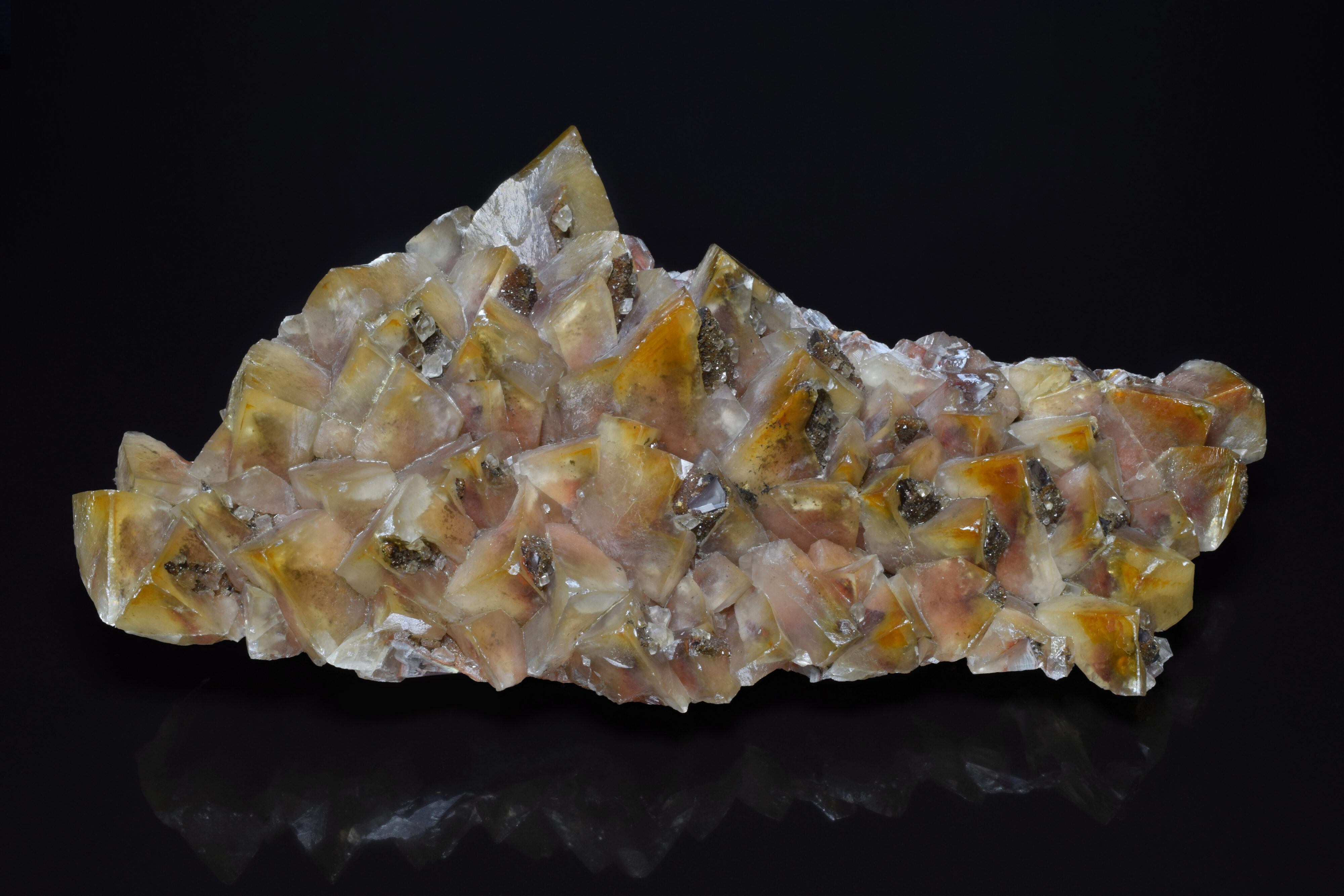 Normal light. Topside of the specimen. Note the dark internal phantoms typical of mariposa calcite.