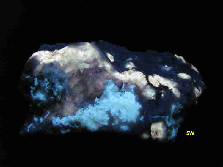 Fluorescence under shortwave UV light.