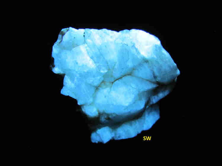 Fluorescence under shortwave UV light.