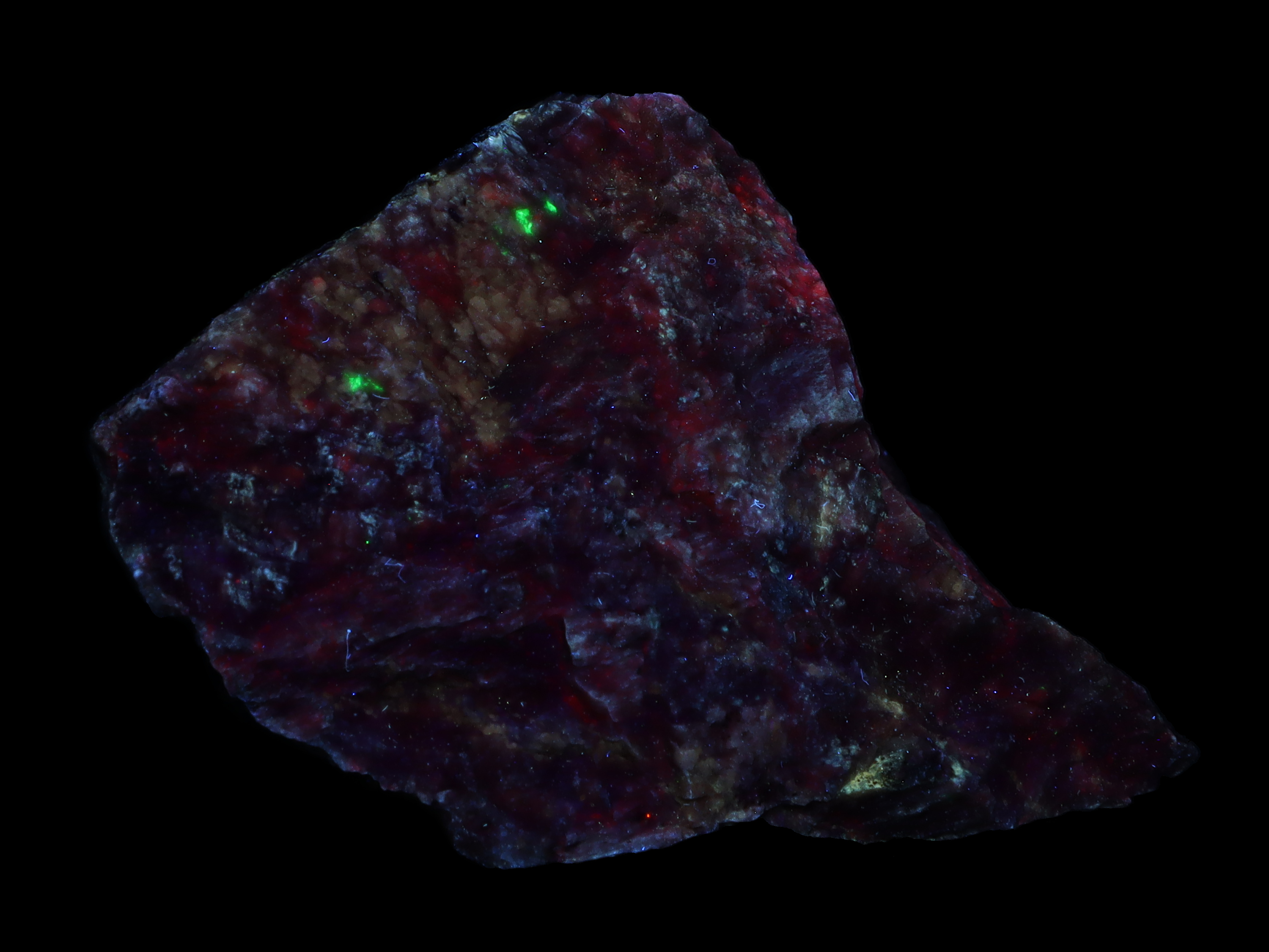 Fluorescence under midwave UV light.
