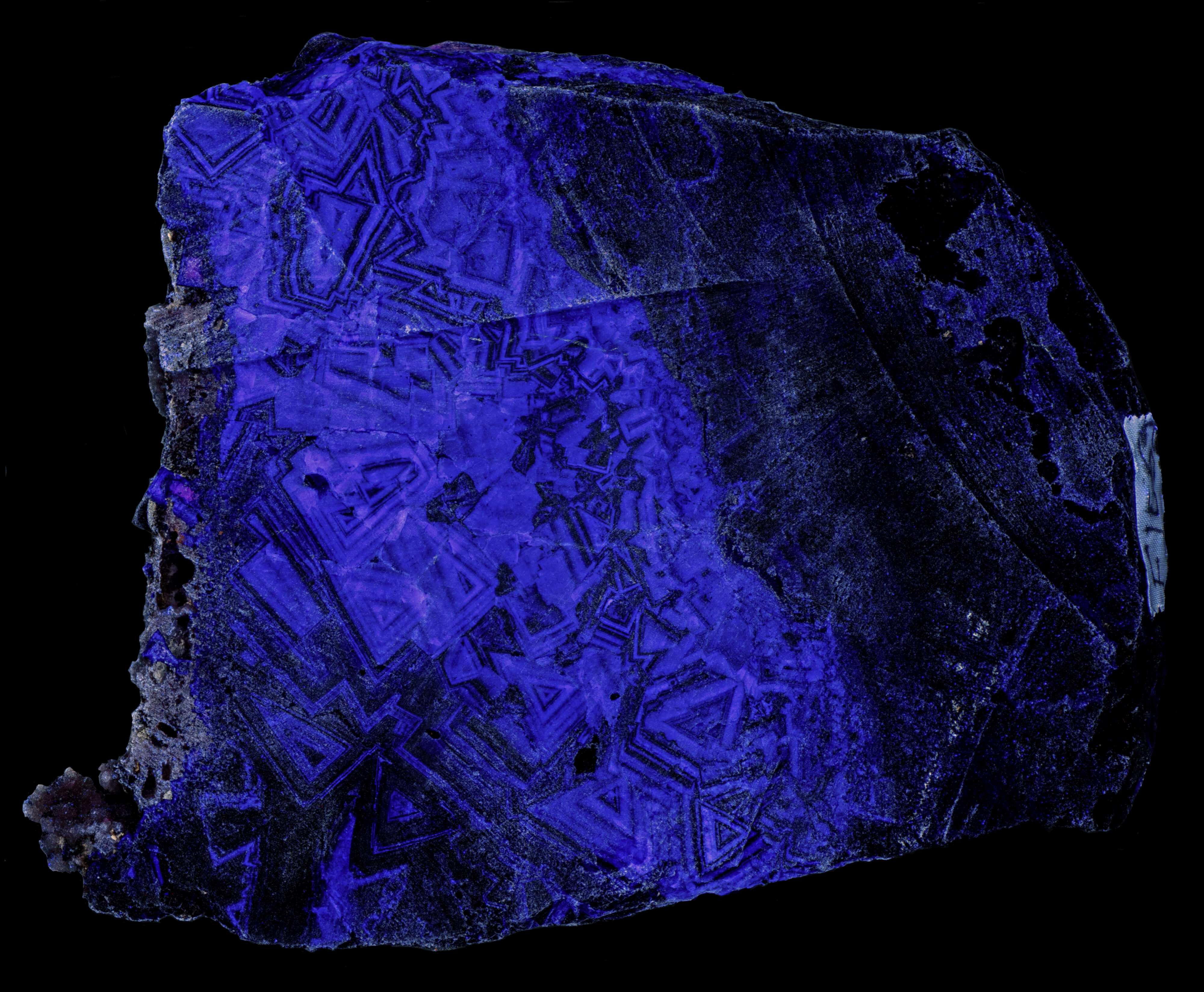 Fluorescence under longwave UV light. Side 3.